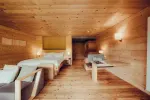 wooden interior with beds and soft lighting