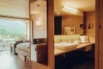 modern hotel room with a view and kitchenette