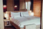 Bright bedroom with a double bed and nightstands