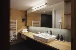 modern bathroom with wooden accents and a sink