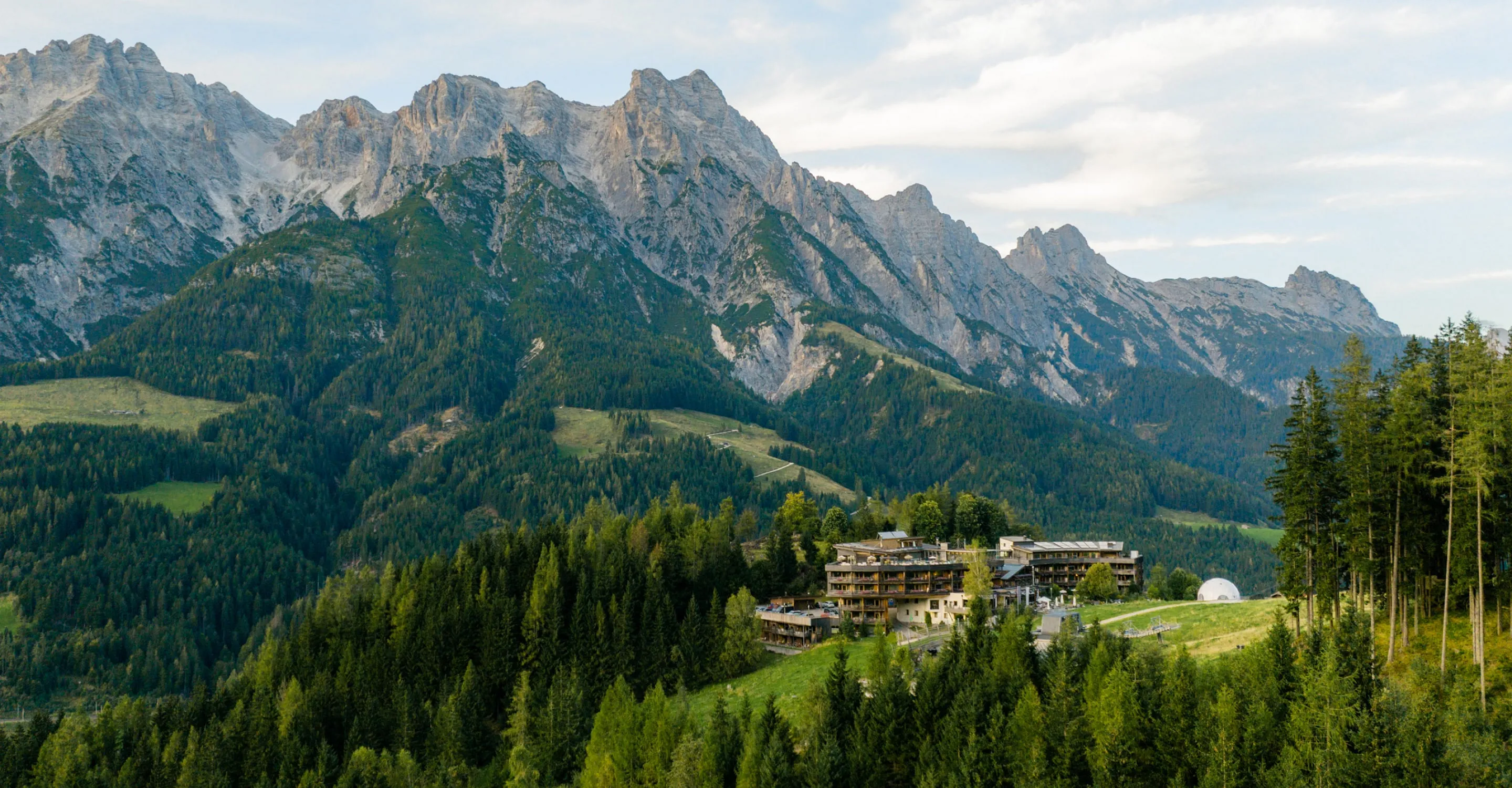 Mountain landscape with Forsthofalm hotel in Leogang